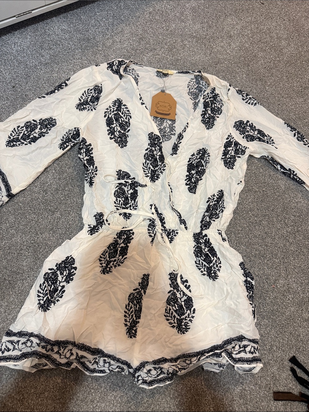 Kori White Romper with Black Floral Embroidery